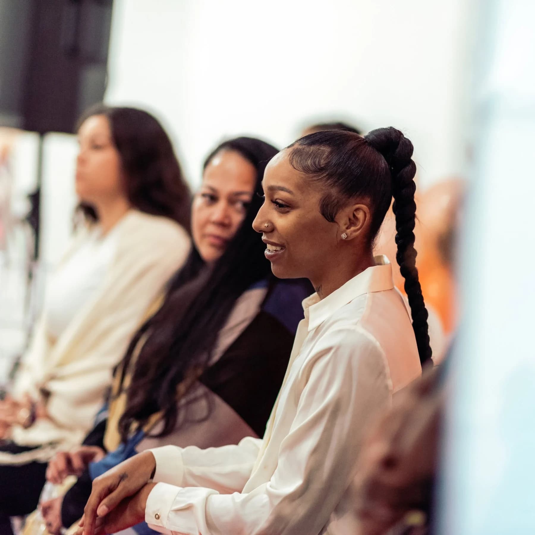 Participants listening during a group conversation.